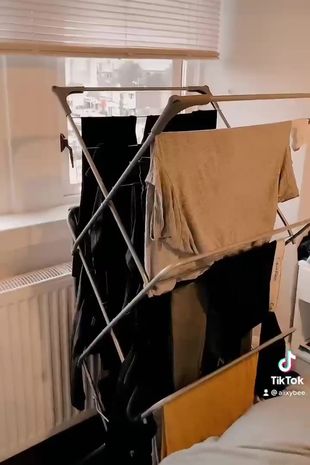 I discovered a bed sheet trick to dry clothes quickly without a dryer – and it's cost-free