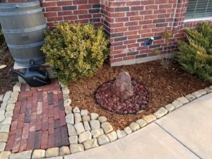 Using rocks instead of mulch – this low-maintenance alternative will control weeds and improve drainage