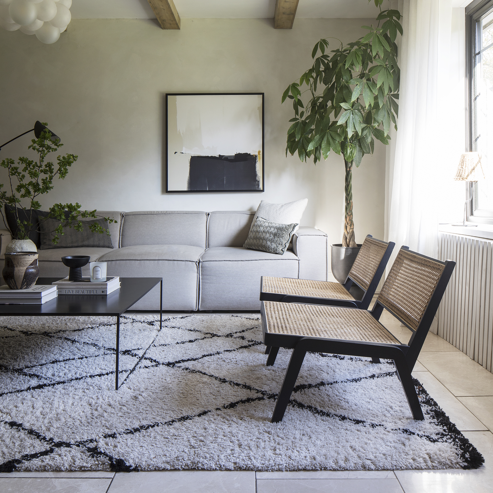 2 Add texture and warmth with a gray rug