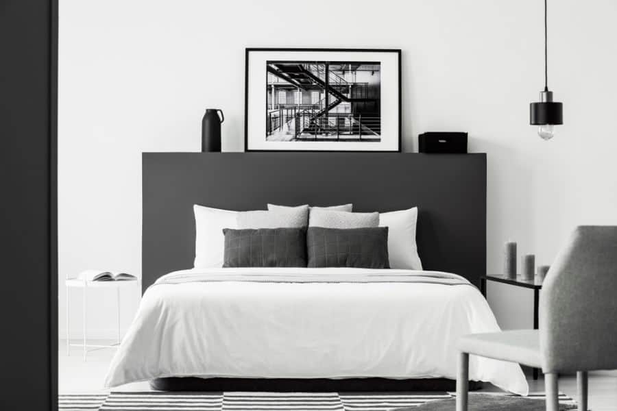 5 Choose an eye-catching black bed as your statement piece