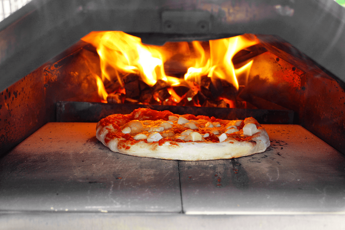 How to light a pizza oven like a pro