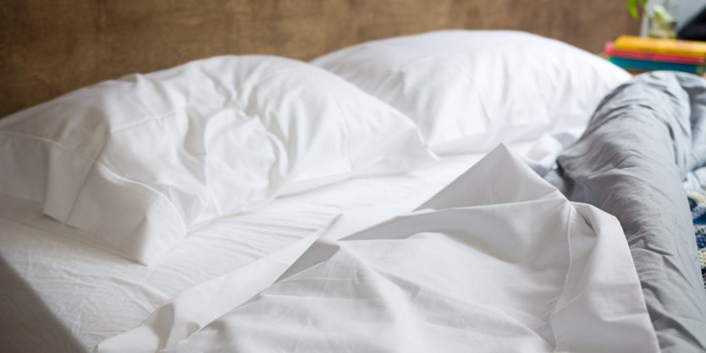 The bed sheet color you should choose for a great night's sleep